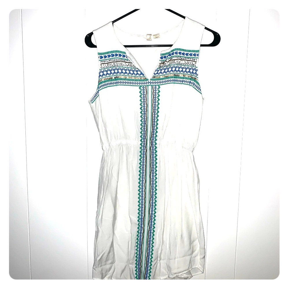 White Sleeveless Dress with Embroidered Design